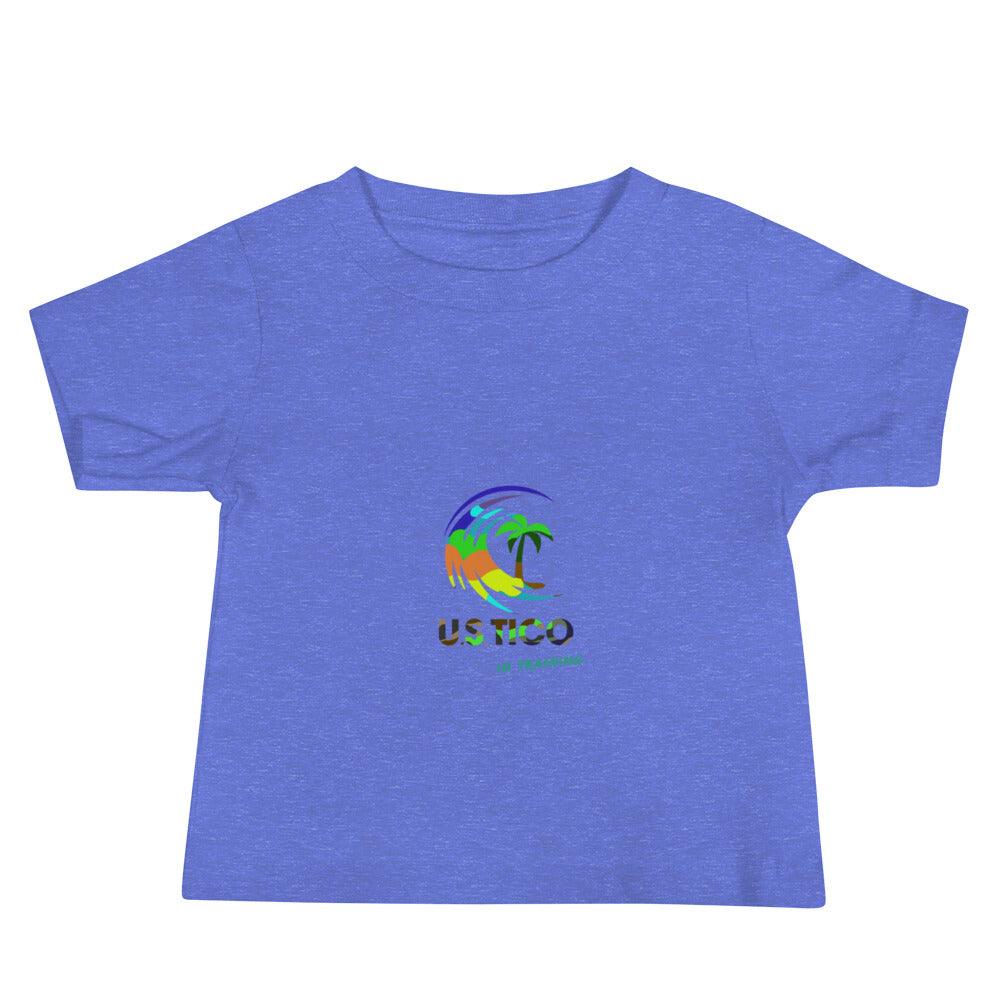 Blue t-shirt featuring a colorful tropical palm tree graphic and 'US TICO' text.