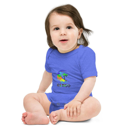 Baby wearing a blue short-sleeve bodysuit with a colorful palm tree graphic and USTICO text.