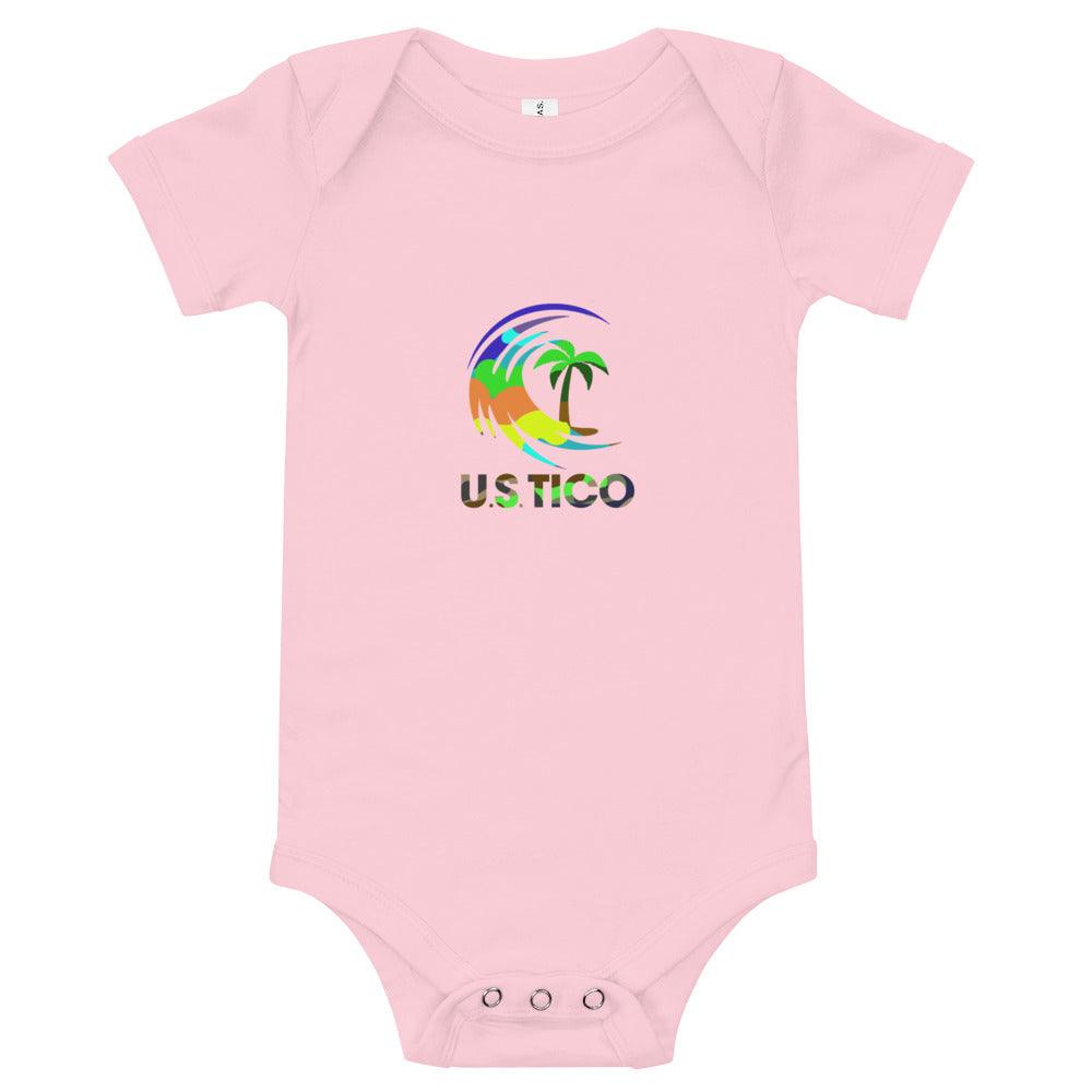 US Tico Baby Short Sleeve One Piece in pale pink cotton with short sleeves, snap closure and colorful tropical palm print
