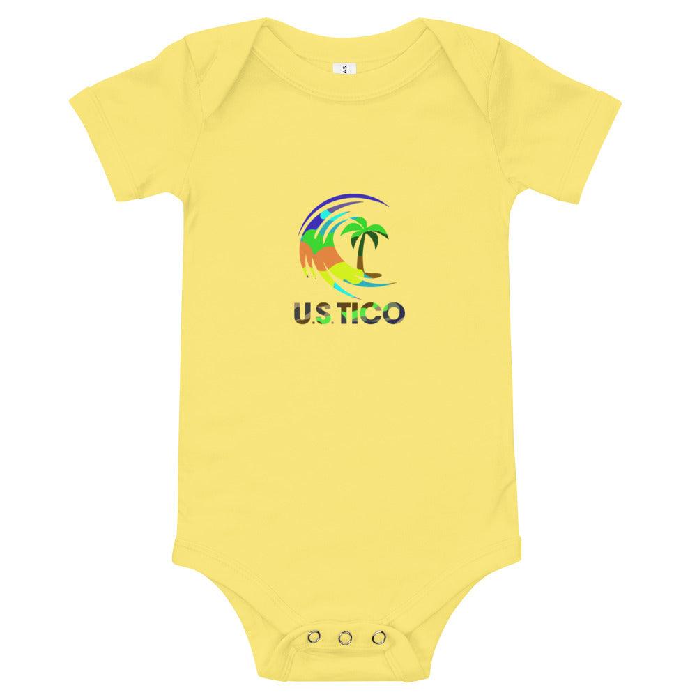 US Tico Baby Short Sleeve One Piece in pale yellow cotton with a colorful tropical palm tree logo and three snap closures