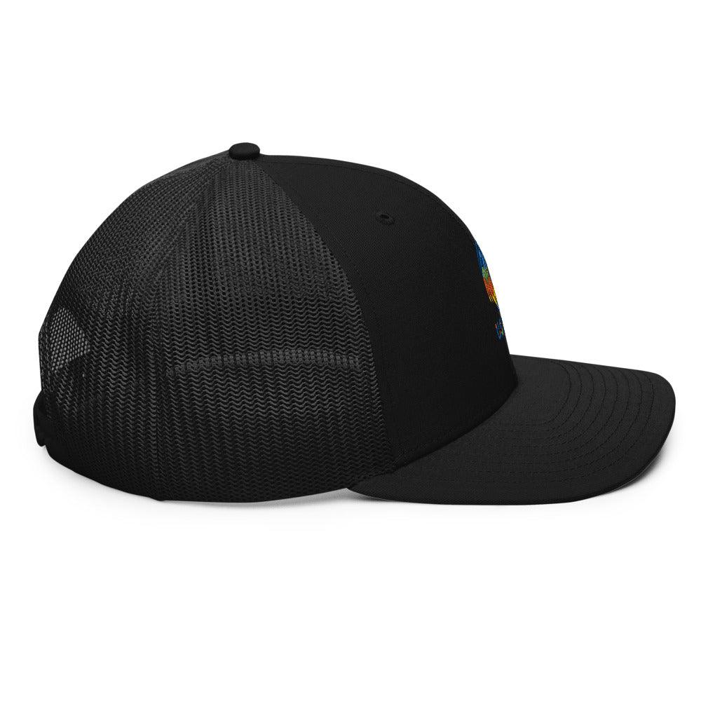 US Tico Colorful Trucker Cap in black with a mesh back, curved brim, and small colorful side graphic