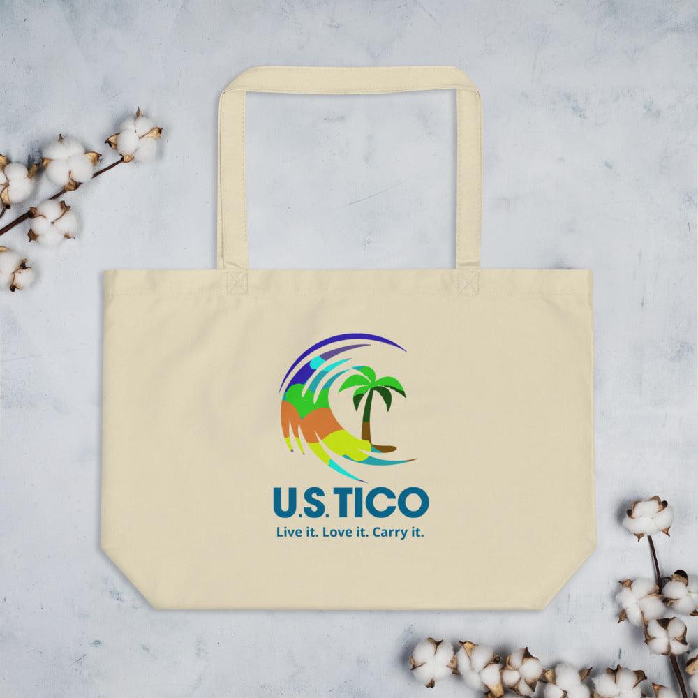 US Tico Large Organic Colorful Tote Bag in natural cream cotton with a vibrant tropical palm tree logo and long handles