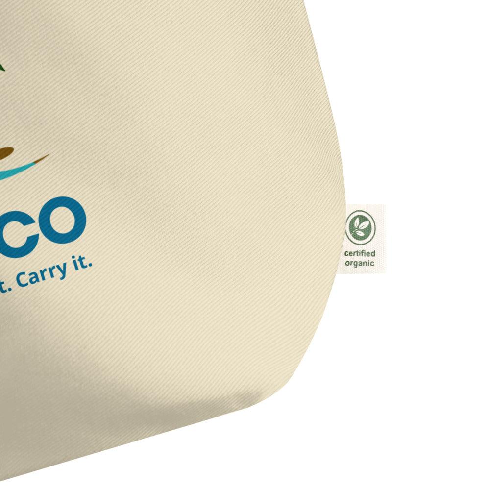 US Tico Large Organic Colorful Tote Bag in natural cream cotton with a partial teal and brown graphic and organic certification tag