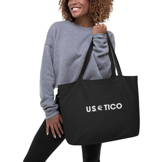 US Tico Large Organic Cotton Tote Bag in black, with long shoulder straps, a wide rectangular shape and white logo